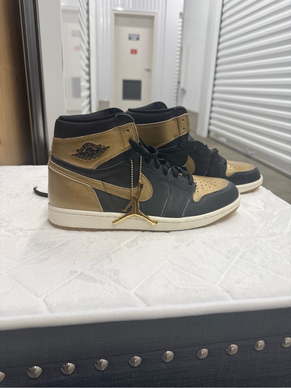 Nike Air Jordan High-Top Sneakers in Black and Metallic Gold
